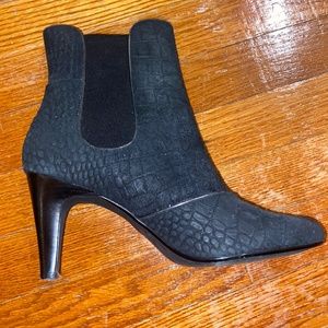 heeled black snakeskin booties